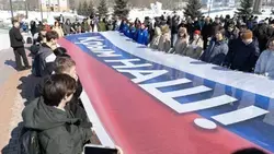 Патриотические акции ко Дню воссоединения Крыма провели на Сахалине